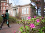 Student walking by Tech Tower.